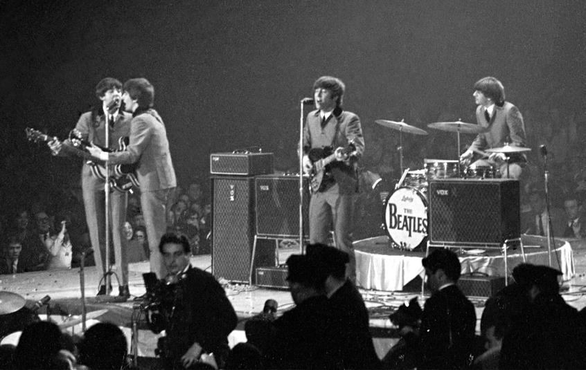 Why did The Beatles stop touring?