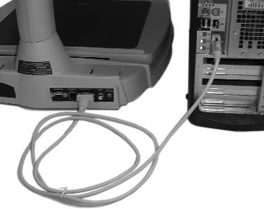 Carry Merlin Plus only by the two recessed handles on the sides of the base for a secured grip (see figure 1). Place it on the table or desk. Place the VGA monitor on the Merlin Plus platform. 3.