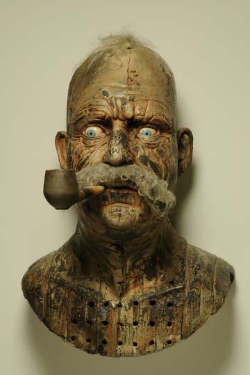 The Smoker Clay, underglaze, slip, encaustic, hair, wood, glaze 28 x 18 x 22 Photograph by Charlie Cummings JH: You ve been in Florida and Tennessee, and I don t know if there are any minorities in