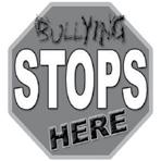 Tell the bully to stop in a loud, authoritative voice and then walk away.