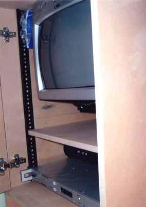 The back opens by unscrewing the screws. In order to easily install your equipment you will need the back to open.
