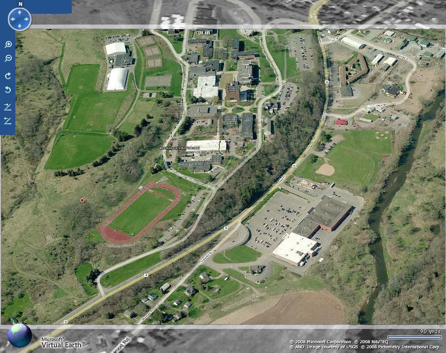 SITES: Campus Field Site. Former tennis courts and dilapidated handball court, located just below soccer field.