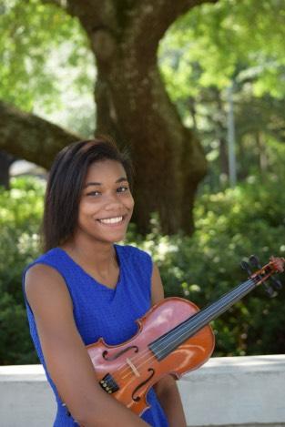 Ms. Syanne Potts is a sophomore music major at Valdosta State University and is Teaching Assistant for the South Georgia String Ms. Potts has been playing violin for almost nine years.