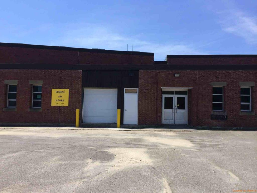 Information Regarding the Loading Dock The dock is at ground level. The garage door is 98" wide and 80" high.