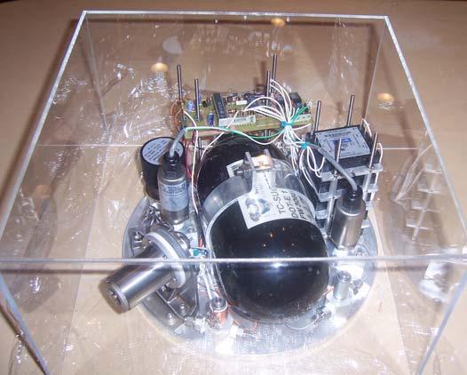Figure 15 Plasma contactor system layout. Note that gas lines and wiring have been omitted for clarity and the top plate and sidewall are shown semi- transparent.