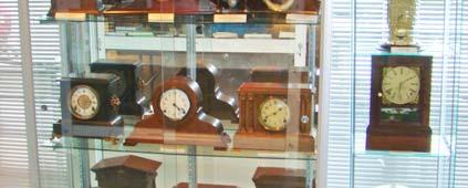 clocks, alarm clocks, wall clocks, and periodicals and books discussing horology.