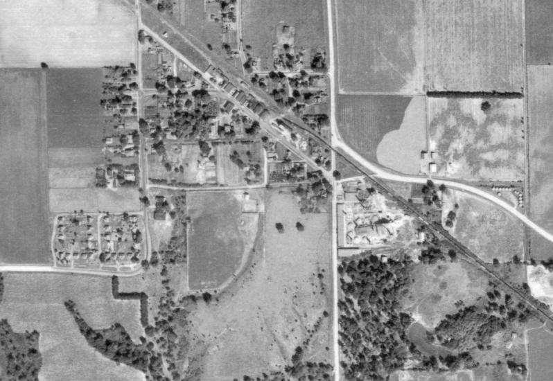 Figure 4. A 1941 aerial photograph of Alsey, Illinois. The Alsey Brick and Tile Company manufacturing plant is outlined in red; the beehive kilns are quite visible.