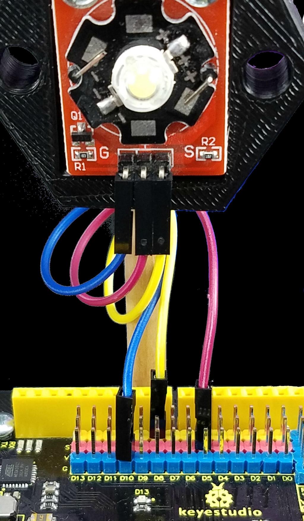 Connect a F/F wire (shown in red) from a male 5v pin on the UNO to the V pin on the LED brick. 3.
