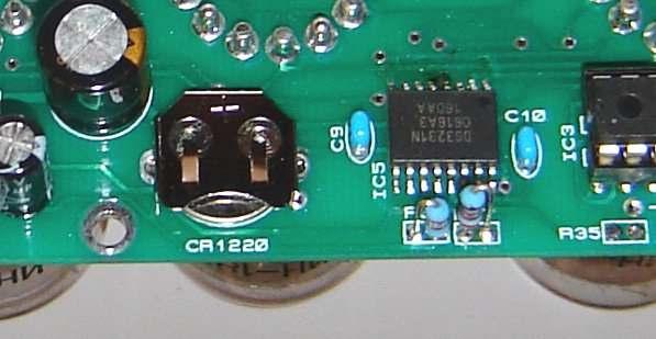 Holding the IC firmly in place with one finger as shown in figure 18 above, now touch the pin where the solder has been applied with the soldering iron. The solder will re-melt and anchor the IC.