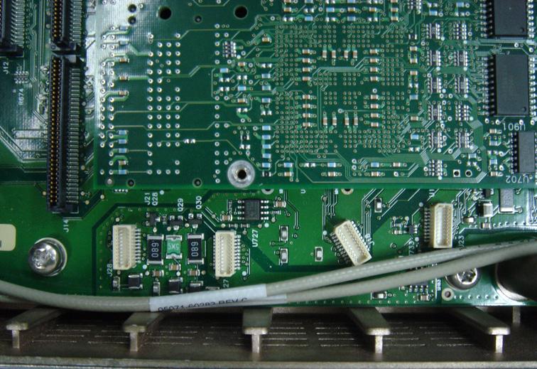 The main board connector from the PSU must be pushed firmly to fully engage it. Take care not to trap any cables when fitting the top clamshell. Analog recorder output connections (Figure 6-14).