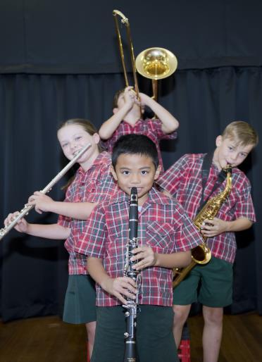 13 All students receiving tuition at school are expected to participate in a school ensemble (band) suited to their ability level, as determined by the Instrumental Music Teacher.