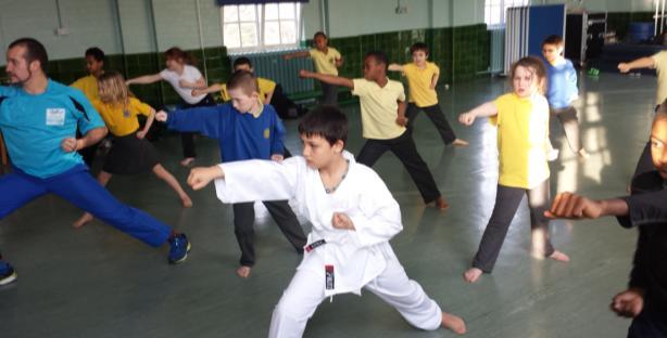 Onur class agrees that it is very challenging but loves learning how to kick, punch and block.