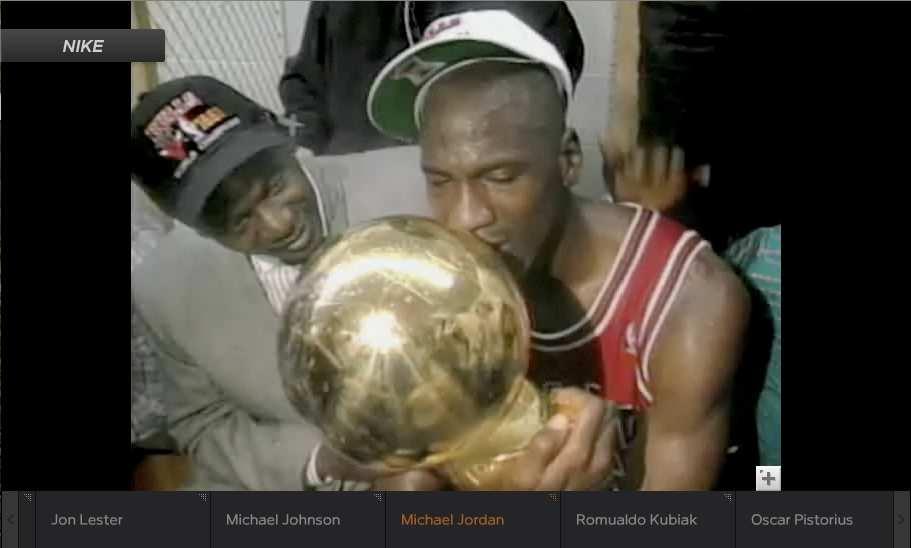 Medium shot of basketball player Michael Jordan. music(consists of bass, guitar, drums) Lyrics.
