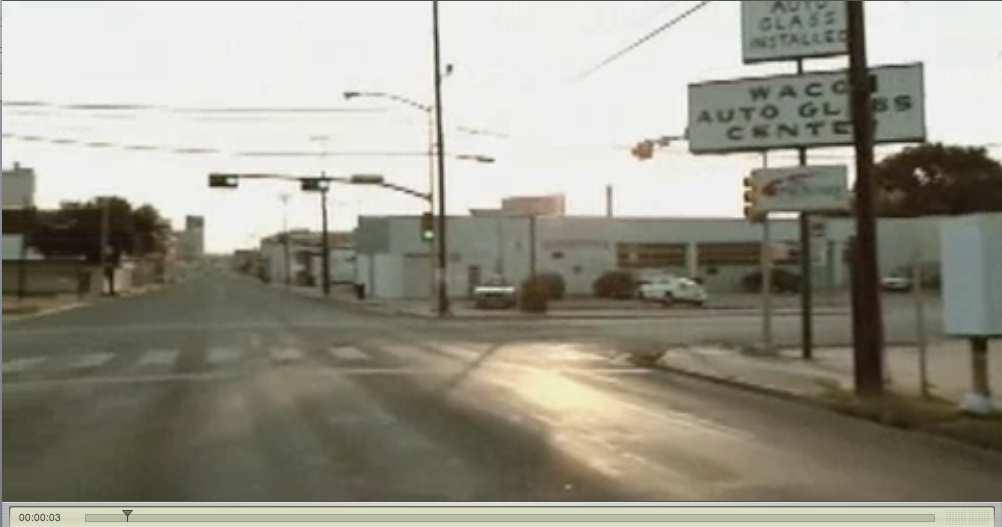 Scene/ Shot Scene 1 Scene 2 Scene 3 Screenshot Visual Information Long shot. Moving camera depicts an almost deserted town. Medium shot. Shows the back of a woman, who walks in a dim hallway.