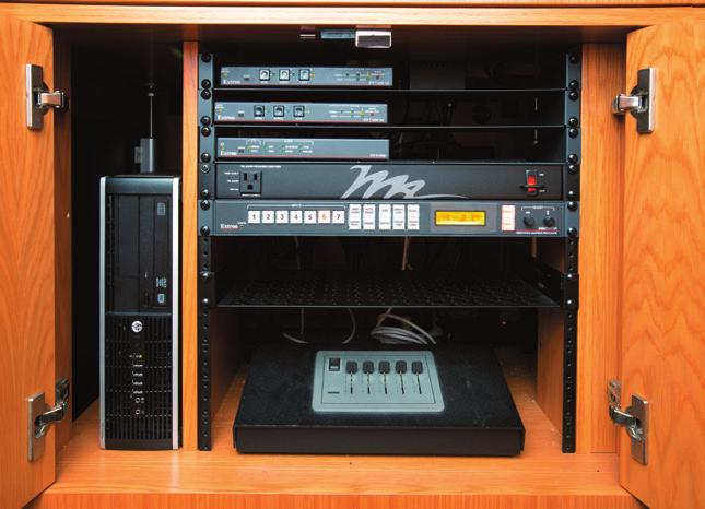 Cable Cubby 600 enclosures installed in the lectern and at both ends of the head table offer HDMI, VGA, Audio, and LAN connectivity plus power for portable devices.