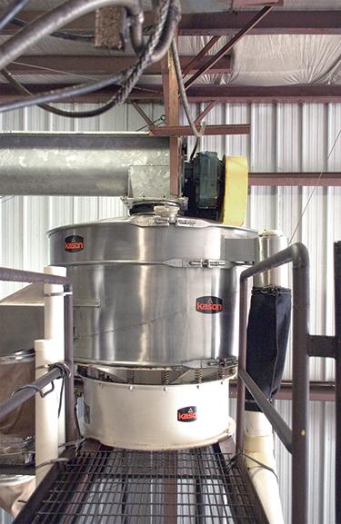 Each screener separates sugar lumps from grains by vibrating a single spring-mounted