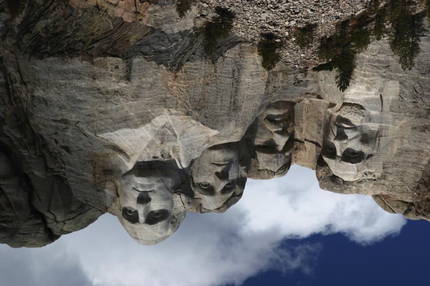 Main Idea Day 1 Mount Rushmore is a huge carving in a stone cliff. The carving shows the faces of four U.S. presidents.