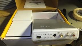 Composite or S-video in with stereo audio. Firewire out. Used, boxed, excellent condition.