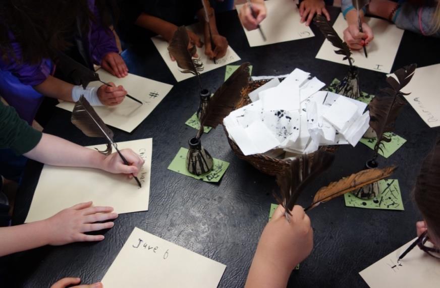 When the students visited the school, they were able to write letters using a quill and ink.