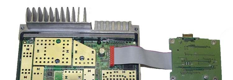 4. Plug the gray ribbon cable from the SK102 connector on