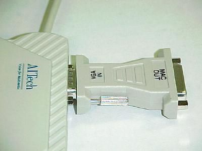 Figure 7 (below) - Shows how the Macintosh output adapter attaches to the VGA Out connector on