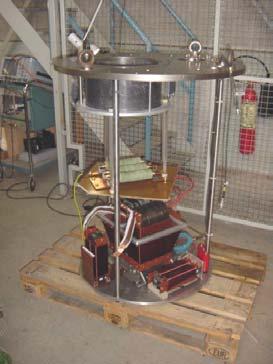 The load assembly shown is operated in an oil-filled klystron tank. The load voltage is monitored with a capacitive divider and the load current with a fast current transformer.