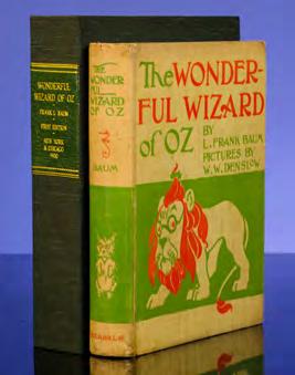 $350 A Spectacular First Edition of the Wizard of Oz [DENSLOW, W.W., illustrator]. BAUM, L. Frank. The Wonderful Wizard of Oz. With pictures by W.W. Denslow. Chicago: Geo.