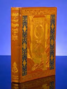 1930 by Riviére & Son in full navy blue morocco with large panel of colored morocco inlays. A splendid copy.