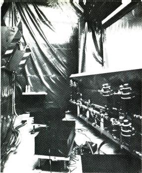 Fig. 7. This behind -the -scenes view at Kodak shows the set -up used for the water screen projection. The hydraulic system used to create the water screen extends from the right to the center.
