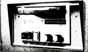 The tape carried a sound channel while also providing a second channel pulse which controlled a punched belt. This belt (not shown) activated the show system's components. called Diapolyecran.