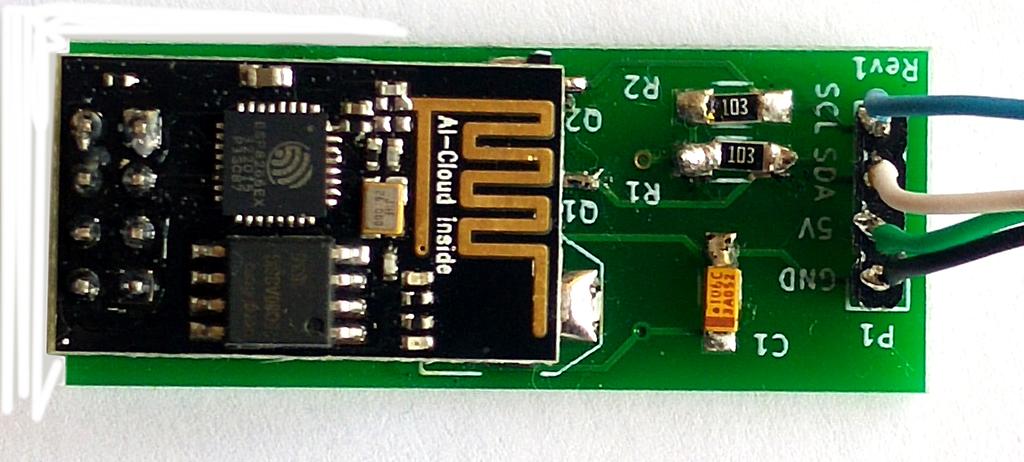 The tiny black ESP8266 board goes into the 8 pins socket on the interface board so that the ESP board covers about half of the interface