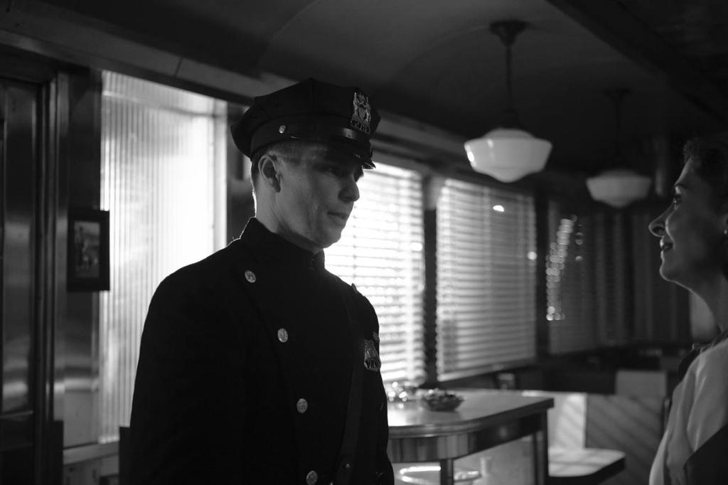 Page Five Sam Rockwell, as Officer