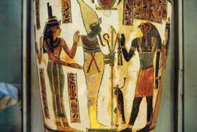 14 Three of the most powerful Egyptian gods are shown here. The god Osiris has a green face. His wife, Isis, is next to him.
