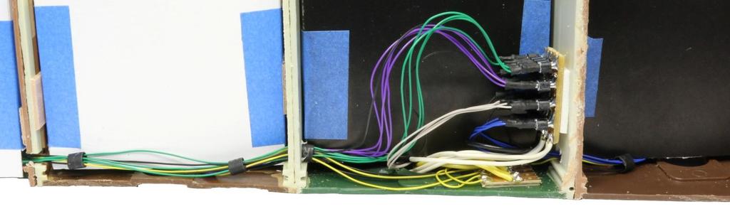 All the ESU wires for the building levels are in colours (green bld1, violet bld2, grey bld3, blue bld1and there is a black common wire from each building) to simplify wiring to the Selection Matrix
