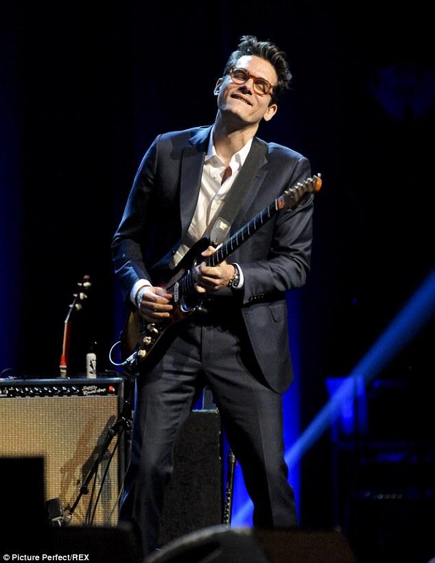 Singer-songwriter John Mayer performs at the
