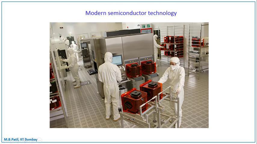 (Refer Slide Time: 20:43) Another picture this person is taking these wafers from one equipment to another.