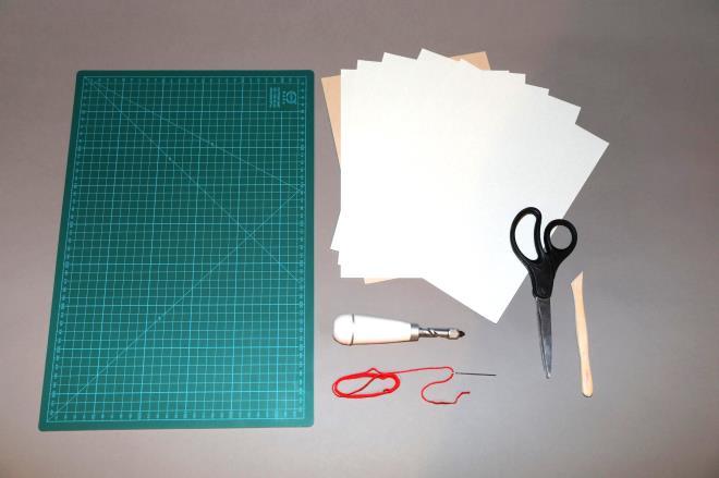 HANDS-ON BOOK BINDING ACTIVITY: CREATE YOUR OWN PAMPHLET STITCH Materials Several sheets of 8.5 x 11 paper 1 sheet of 8.