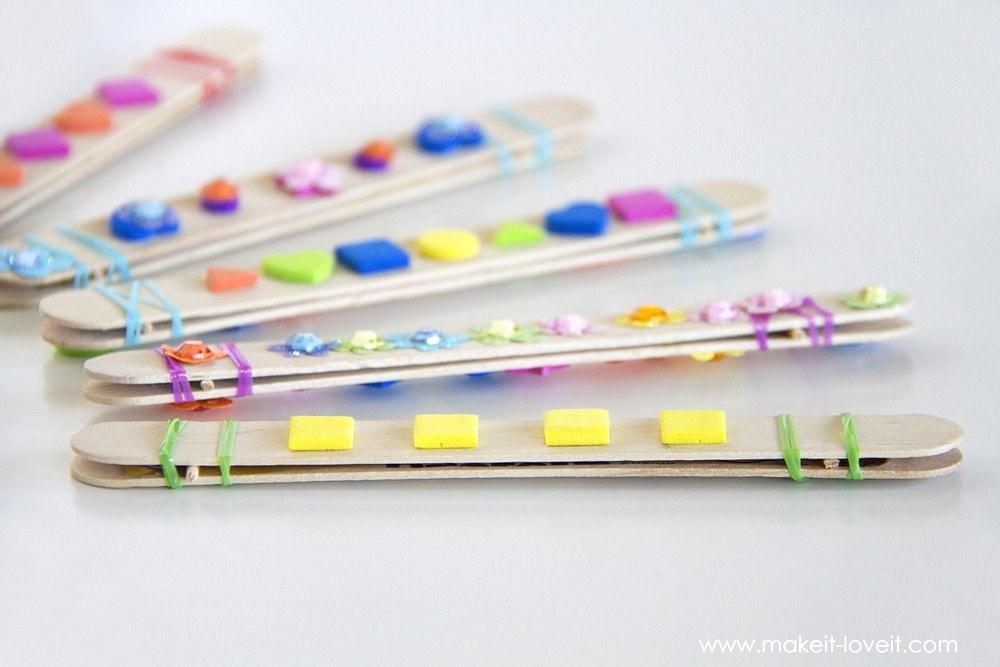 Popsicle Stick Harmonica Supplies 2 Popsicle Sticks { Preferably the wide ones } 2 Rubber Bands or string A strip of paper the same size as the Popsicle Stick 2 toothpicks cut the