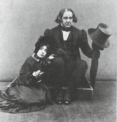 8 GILBERT AND SULLIVAN S RESPECTABLE CAPERS Fig. 1.1 The newly reformed Sir Despard (Rutland Barrington) and Mad Margaret (Jessie Bond) relax after their respectable capers. Ruddigore, Act Two.