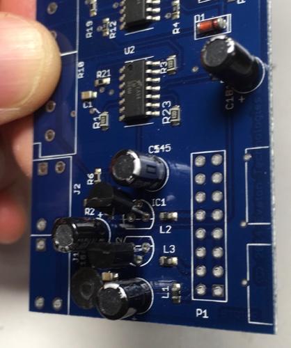 Make sure the flat edge of the 78L05 matches the flat edge of the silkscreen. IC2, 79L05 The 79L05 is a negative voltage regulator.