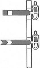 5. Distant Signals Distant signals are fixed some distance to the rear of the home signal. a. Distant Signals: Rear of the Home Signal A distant semaphore signal is a yellow fishtailed arm with a black fishtailed band.