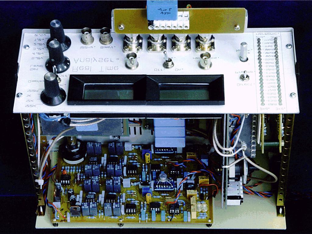 Figure 7) The same assembly now viewed from the front shows the Real Time printed board mounted on the case back panel.