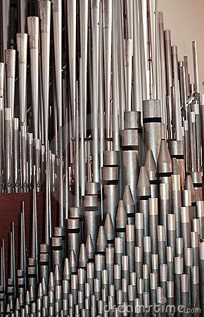 Organ pipes are made of metal or wood. The smallest can be less than 6 inches long; the largest can be 32 feet long. Wind is blown through them to make the pipes sound.