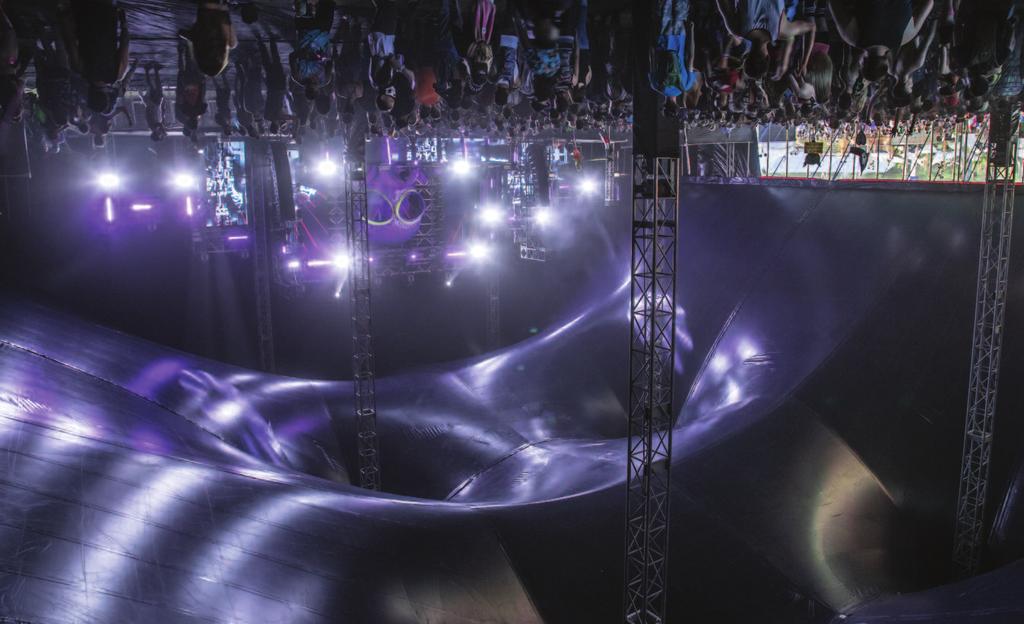 CONCERTS Above: The Temple Noctem stage had an aggressive feel, much like the hardstyle music performed there. Below: The gas mask featured on the set is a veteran of other Insomniac productions.