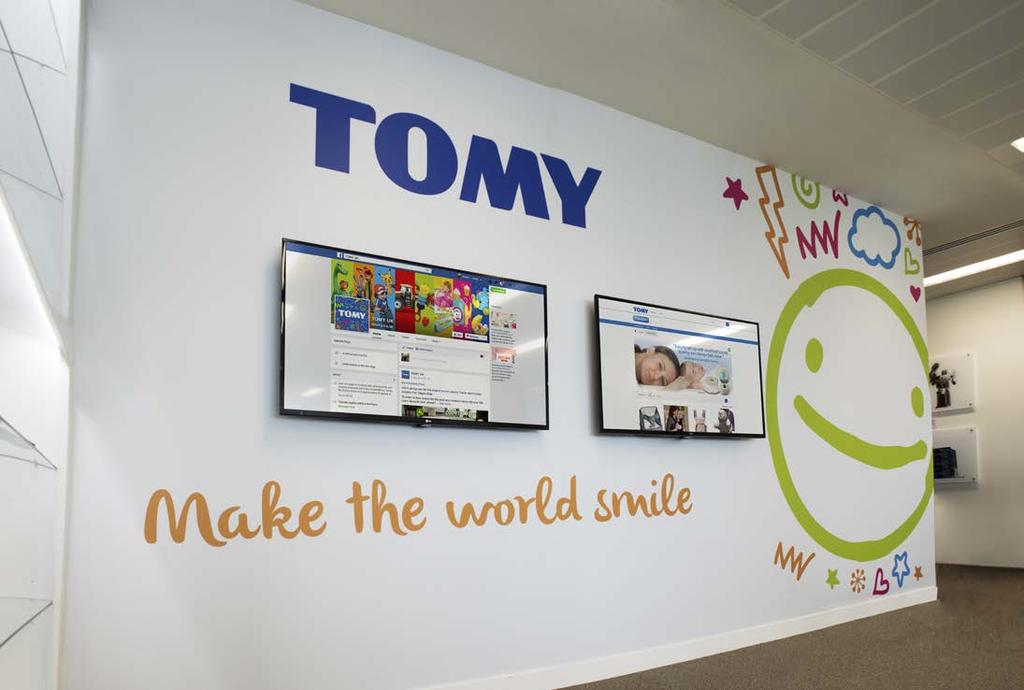 Main reception at Tomy Head Office, showing dual LG 49" HDTV