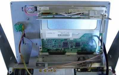 It must be removed in order to remove the Main PCB (mother board) or the LCD Display. Figure 5-19.