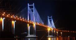 EXAMPLES Name of Bridge Overview Construction No. of Lanes Length of Cost (Bridge Cable-stayed (100 Mil.