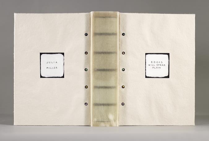 Elaine Nishizu Non-adhesive dos rapporté book structure, sewn on cords and blue Japanese paper concertina using black linen thread, translucent vellum spine and Iowa paper board covers and endsheets,