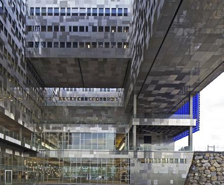 Jean Nouvel s city hall in Montpellier and residential tower on 11th avenue in New York City. The facades of both buildings are at once transparent and reflective.