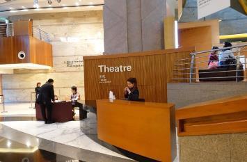The Venue At the Theatre Entrance The play takes place at the